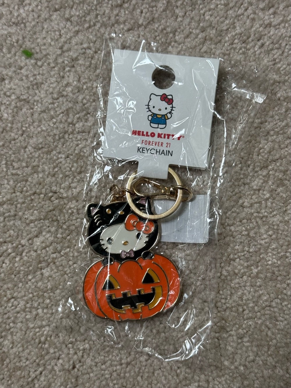 Forever 21 Hello Kitty Pumpkin Keychain in Orange and Gold
